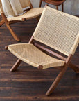 Alta™ woven rattan and teak folding lounge chair