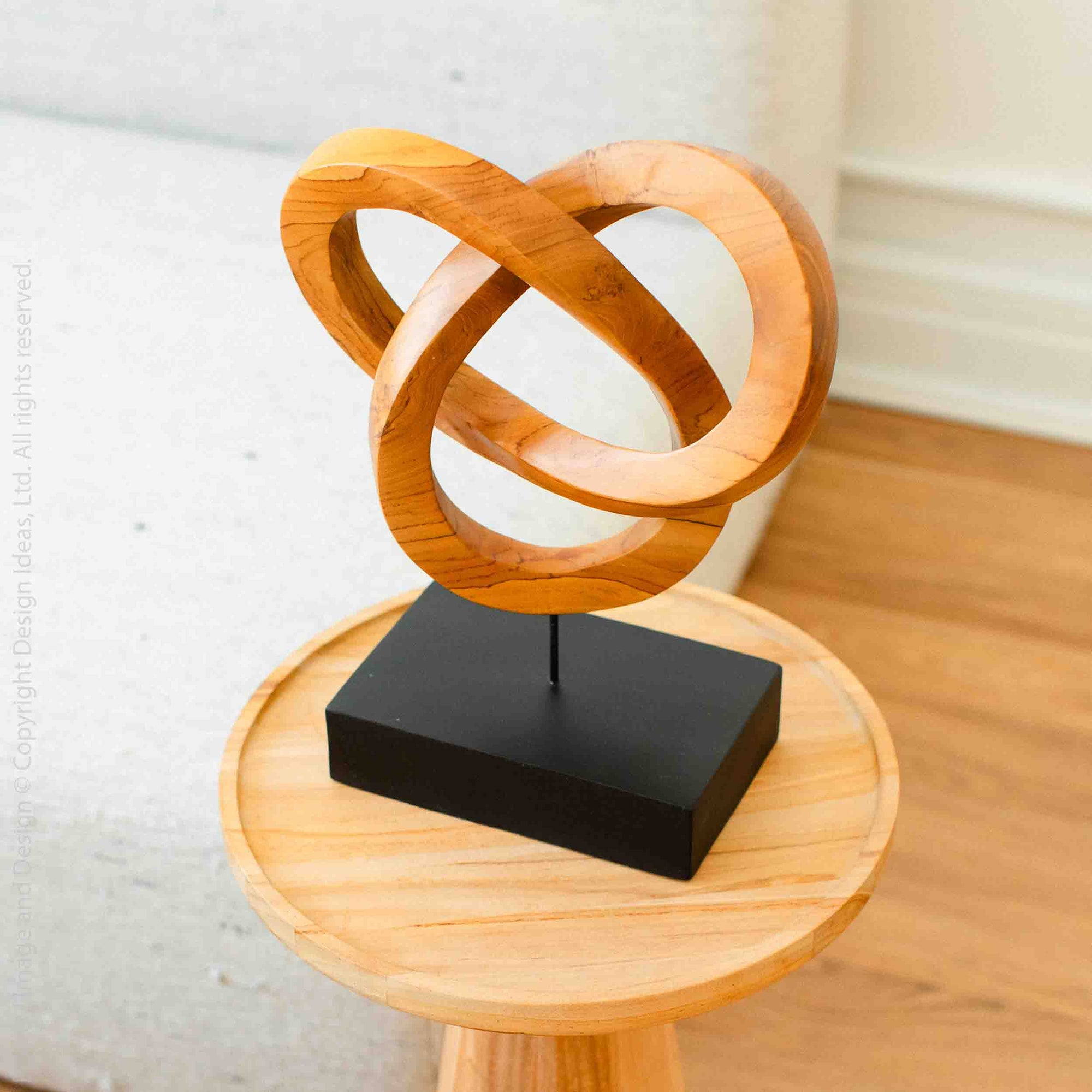 Mabini™ hand carved teak sculpture