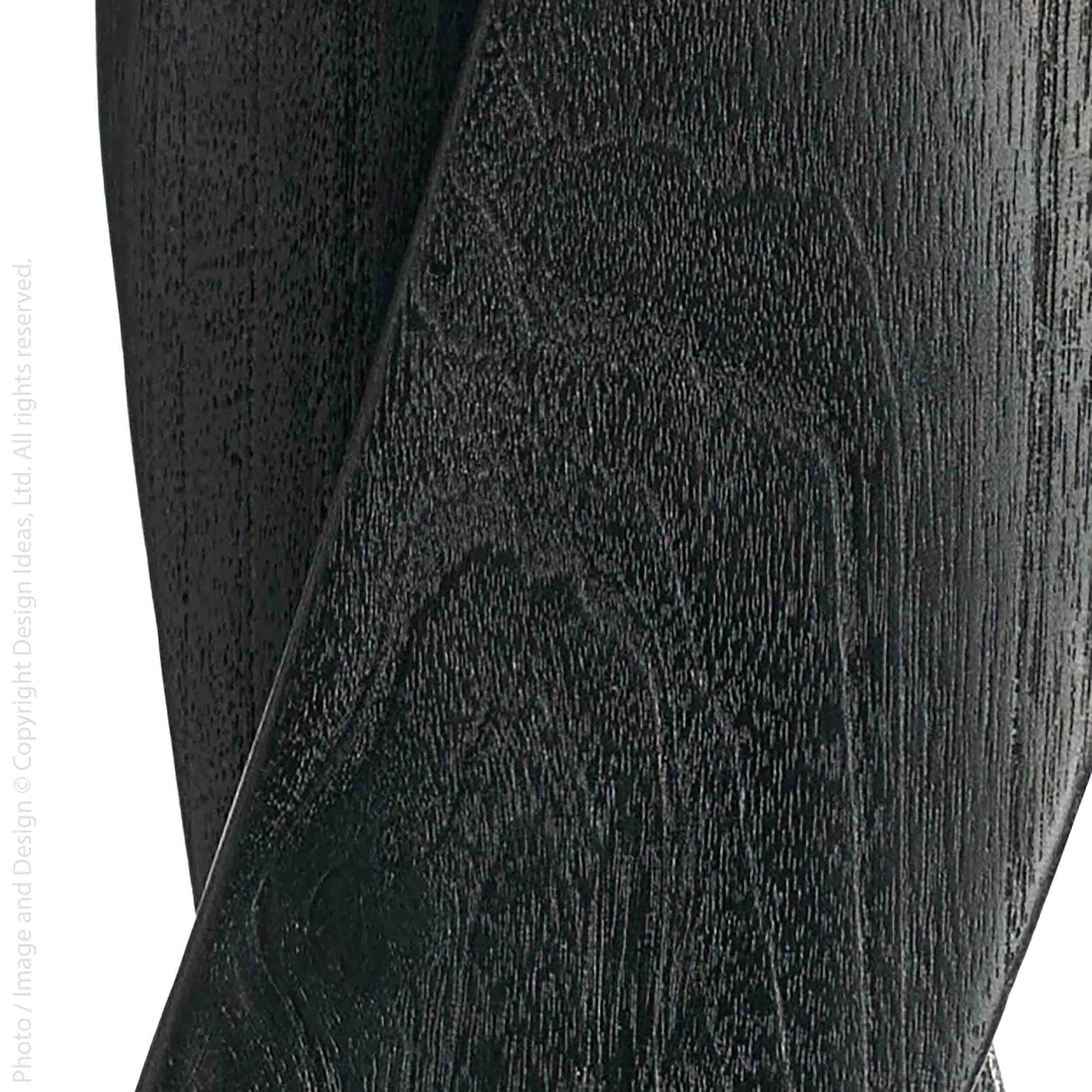 Mandori™ hand carved teak sculpture