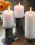 Rennik™ taper holder (2in) - Black | Image 1 | Premium Candleholder from the Rennik collection | made with Steel for long lasting use | texxture