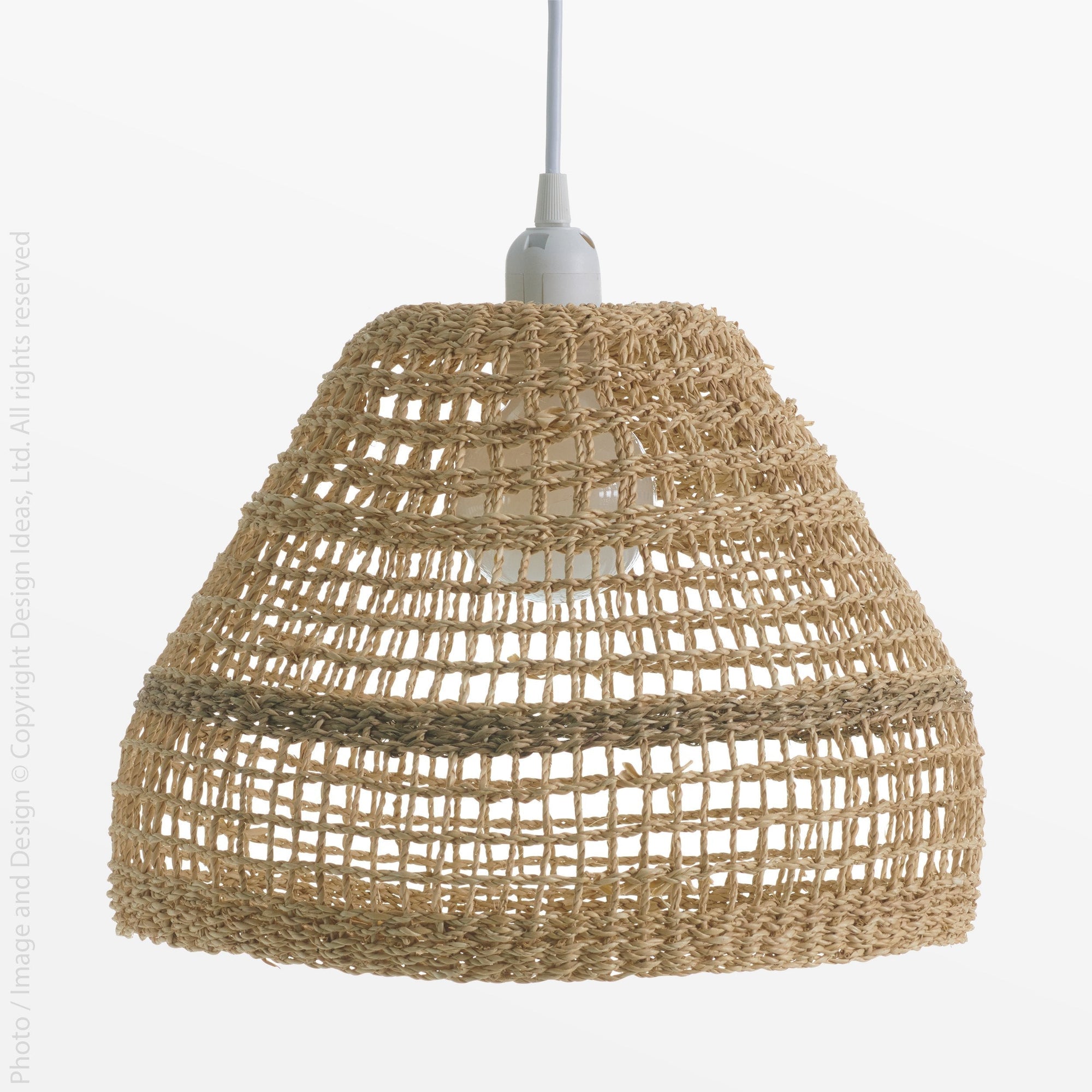 Nevis  Lampshade - natural Color | Image 1 | From the Nevis Collection | Masterfully assembled with natural  for long lasting use | Available in natural color | texxture home