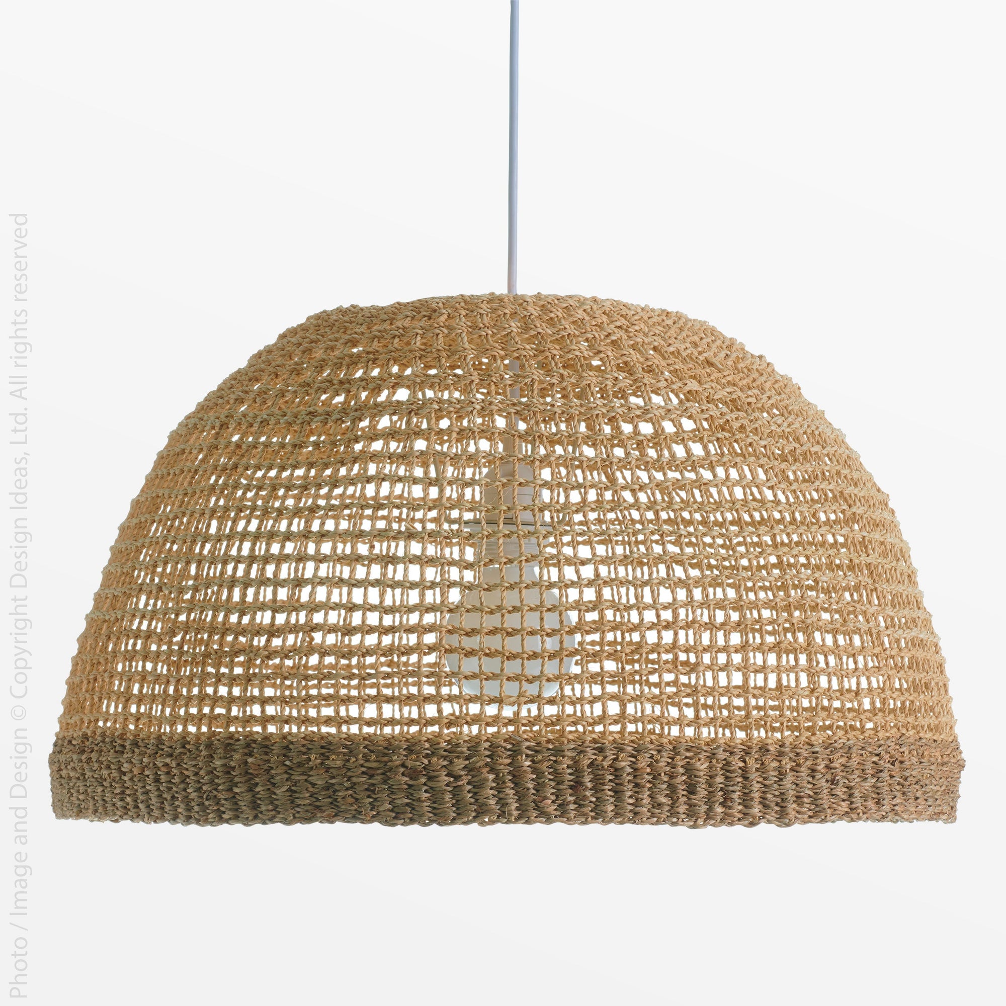 Cayman Seagrass Lampshade - natural Color | Image 1 | From the Cayman Collection | Exquisitely handmade with natural seagrass for long lasting use | Available in natural color | texxture home