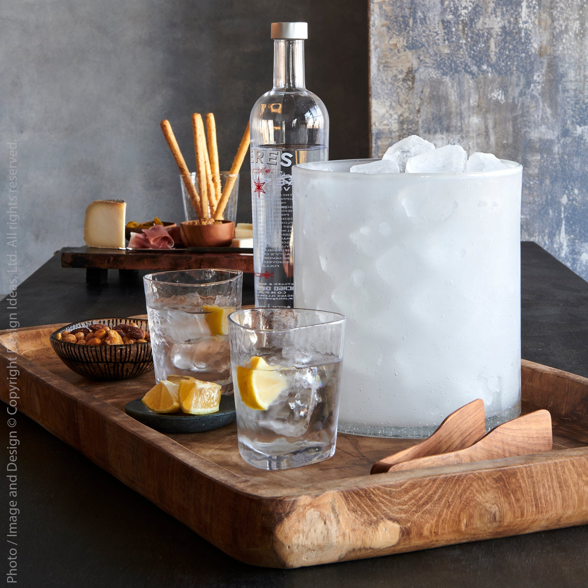 Chiku Teak Tongs Silver Color | Image 3 | From the Chiku Collection | Expertly made with natural teak for long lasting use | These utensils are sustainably sourced | Available in natural color | texxture home