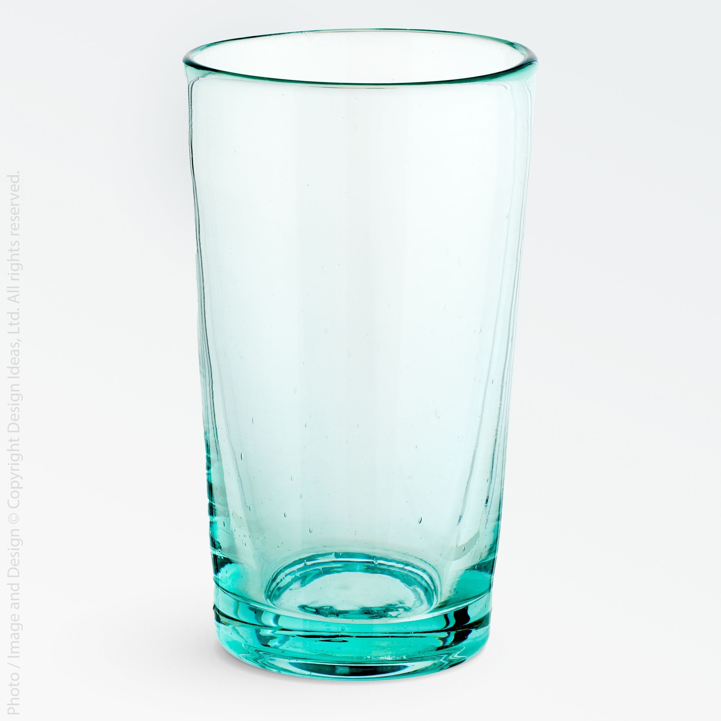 Ravena Drinking Glass (Tall) - natural Color | Image 1 | From the Ravena Collection | Elegantly constructed with natural glass for long lasting use | These glass are sustainably sourced | Available in cyan color | texxture home