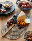 Stoneshard™ plate (11.8 dia x 0.5 in.) - Gray | Image 5 | Premium Plate from the Stoneshard collection | made with Riverstone for long lasting use | texxture