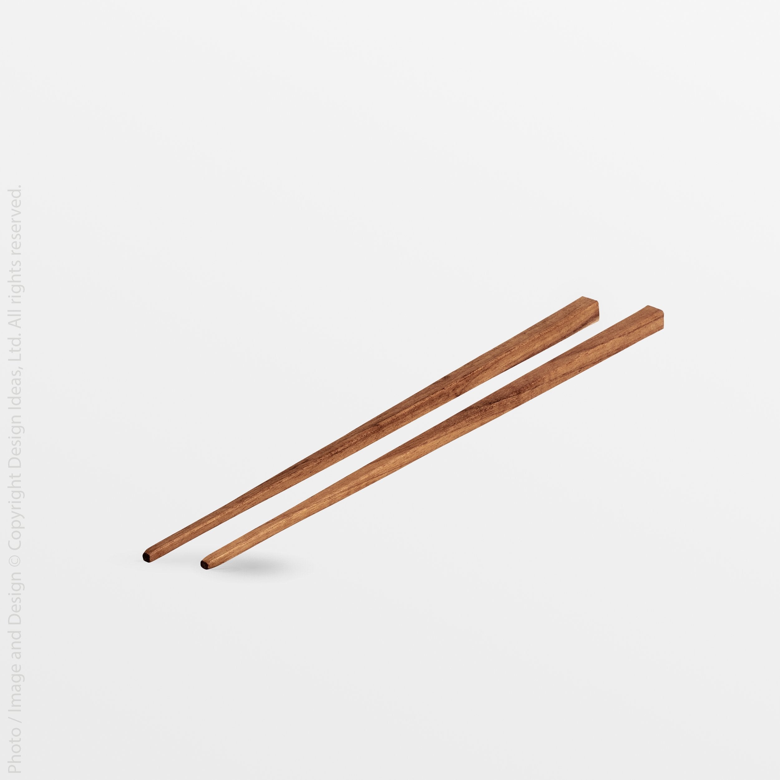 Chiku Teak Chopsticks - Black Color | Image 1 | From the Chiku Collection | Masterfully assembled with natural teak for long lasting use | These utensils are sustainably sourced | Available in natural color | texxture home