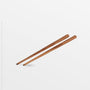Chiku Teak Chopsticks - Black Color | Image 1 | From the Chiku Collection | Masterfully assembled with natural teak for long lasting use | These utensils are sustainably sourced | Available in natural color | texxture home