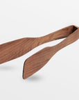 Chiku Teak Tongs - Black Color | Image 1 | From the Chiku Collection | Expertly made with natural teak for long lasting use | These utensils are sustainably sourced | Available in natural color | texxture home