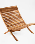 Barcelona Teak Beach Chair - white color | Image 1 | From the Barcelona Collection | Masterfully assembled with natural teak for long lasting use | This chair is sustainably sourced | Available in natural color | texxture home