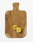 Takara Teak Root Cutting Board - Natural Color | Image 1 | From the Takara Collection | Elegantly handmade with natural teak root for long lasting use | This cutting board is sustainably sourced | Available in natural color | texxture home