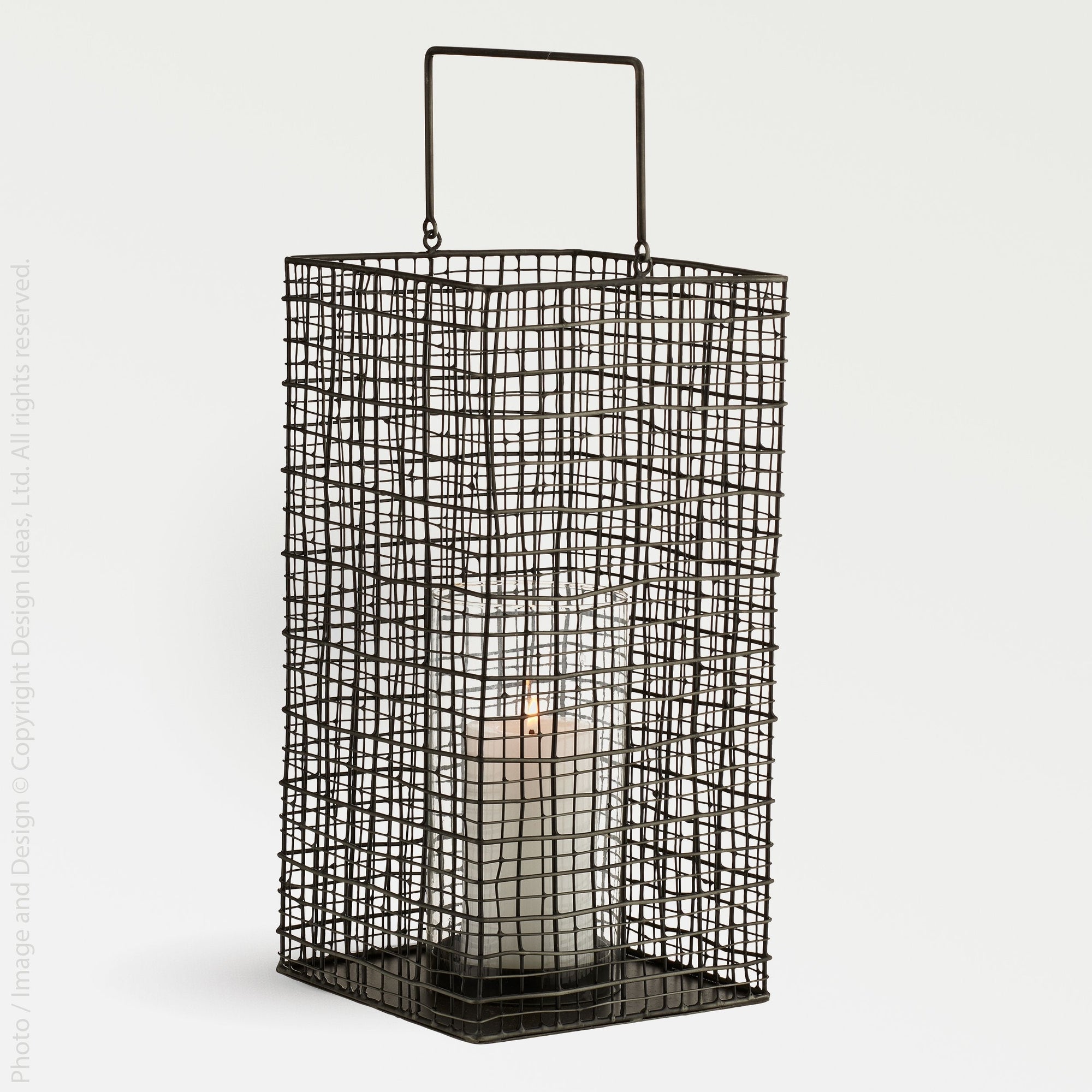 Trellis Glass Lantern (Tall) - Clear Color | Image 1 | From the Trellis Collection | Expertly crafted with natural glass for long lasting use | Available in clear color | texxture home