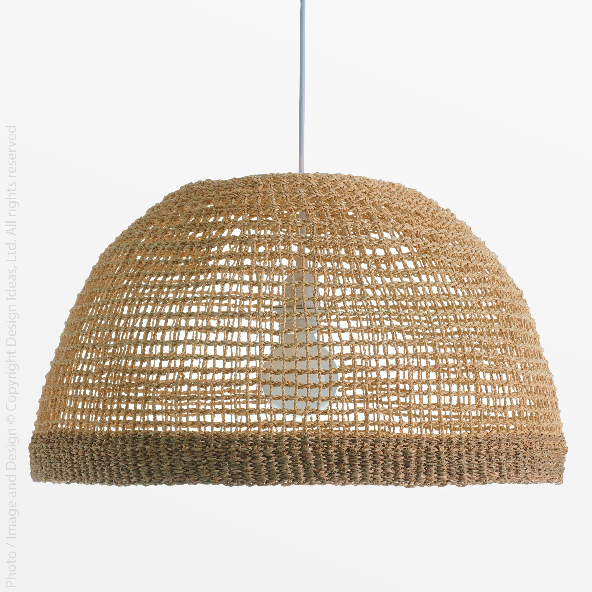 Cayman Seagrass Lampshade - natural Color | Image 1 | From the Cayman Collection | Exquisitely handmade with natural seagrass for long lasting use | Available in natural color | texxture home