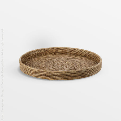 Liana Rattan Round Tray - Natural Color | Image 1 | From the Liana Collection | Expertly crafted with natural rattan for long lasting use | Available in natural color | texxture home
