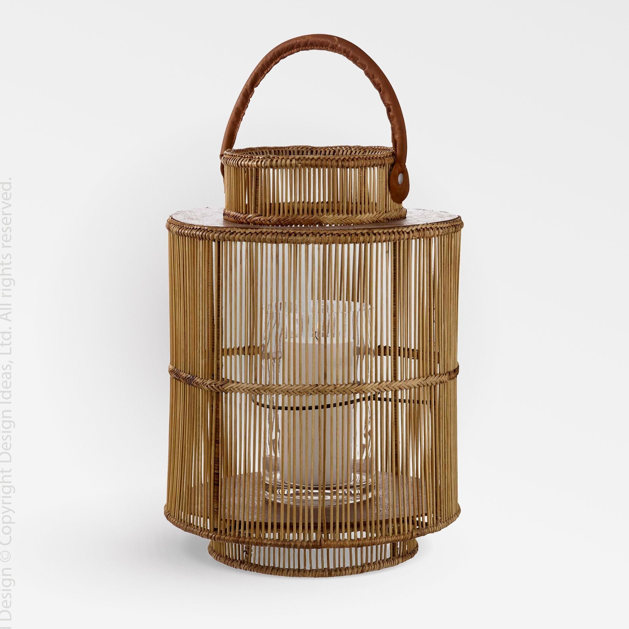 Liana Rattan Lantern - Natural Color | Image 1 | From the Liana Collection | Masterfully constructed with natural rattan for long lasting use | Available in natural color | texxture home