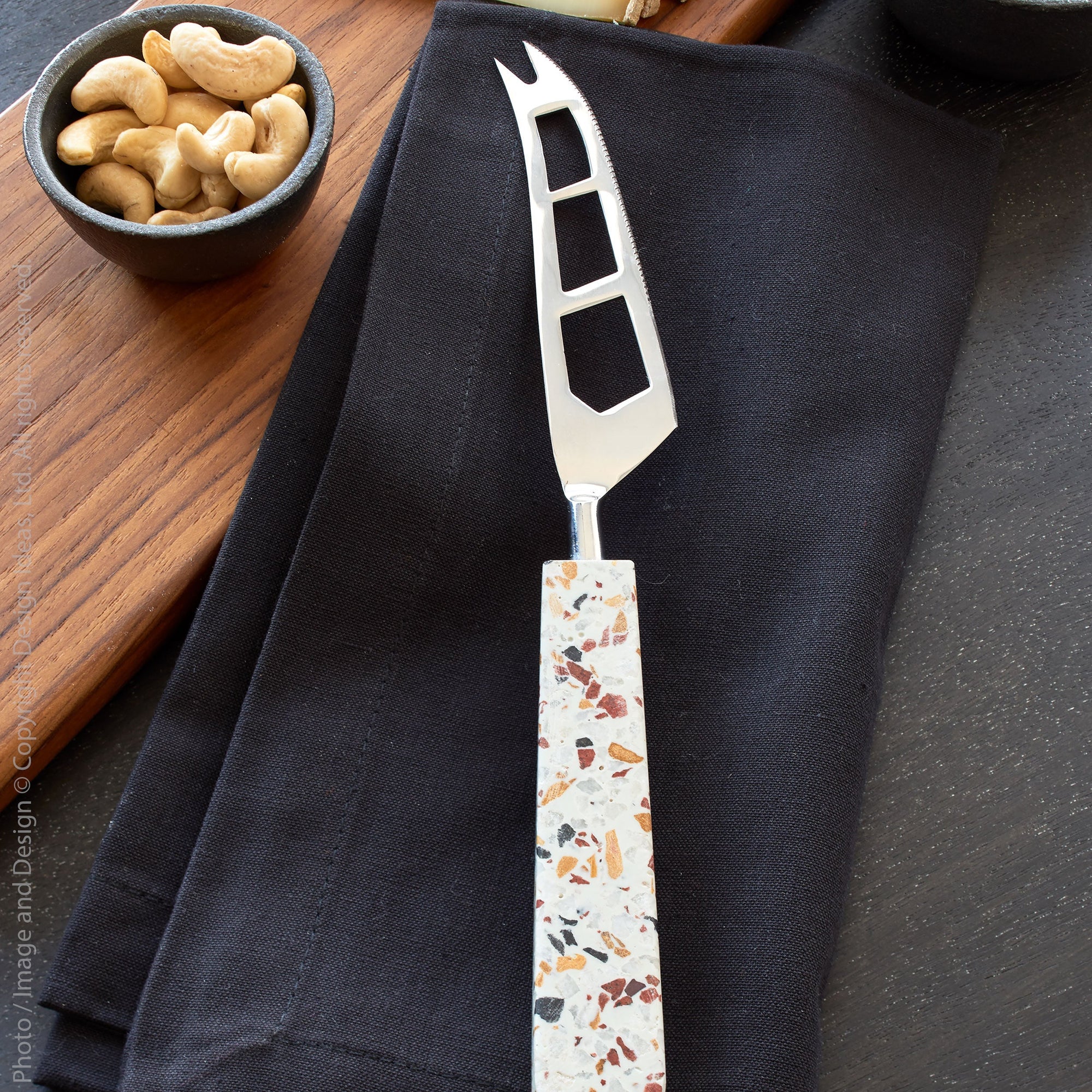 Mancha Stainless Steel Cheese Knife Black Color | Image 3 | From the Mancha Collection | Skillfully handmade with natural stainless steel for long lasting use | Available in terrazzo color | texxture home