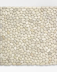 Beachstone Stones Placemat - Natural color | Image 1 | From the BeachStone Collection | Masterfully created with natural stones for long lasting use | Available in white color | texxture home