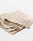Capri Loosely Woven Cotton Napkins (Set of 4) - natural Color | Image 1 | From the Capri Collection | Masterfully Loosely Woven with natural cotton for long lasting use | These napkins are sustainably sourced | Available in natural color | texxture home