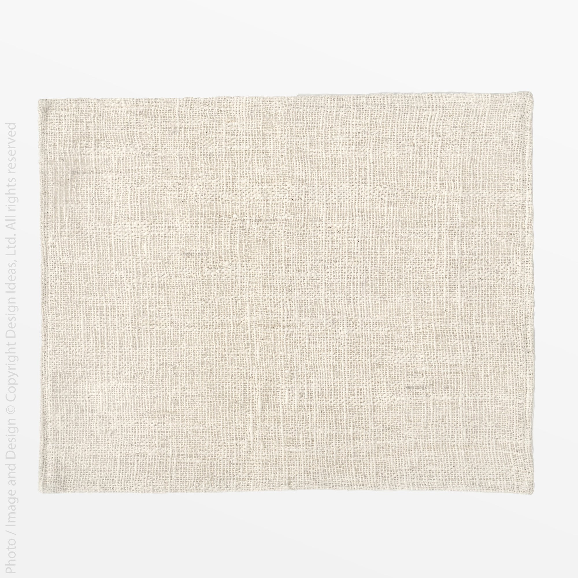 Capri Loosely Woven Cotton Placemat - natural Color | Image 1 | From the Capri Collection | Masterfully Loosely Woven with natural cotton for long lasting use | Available in natural color | texxture home