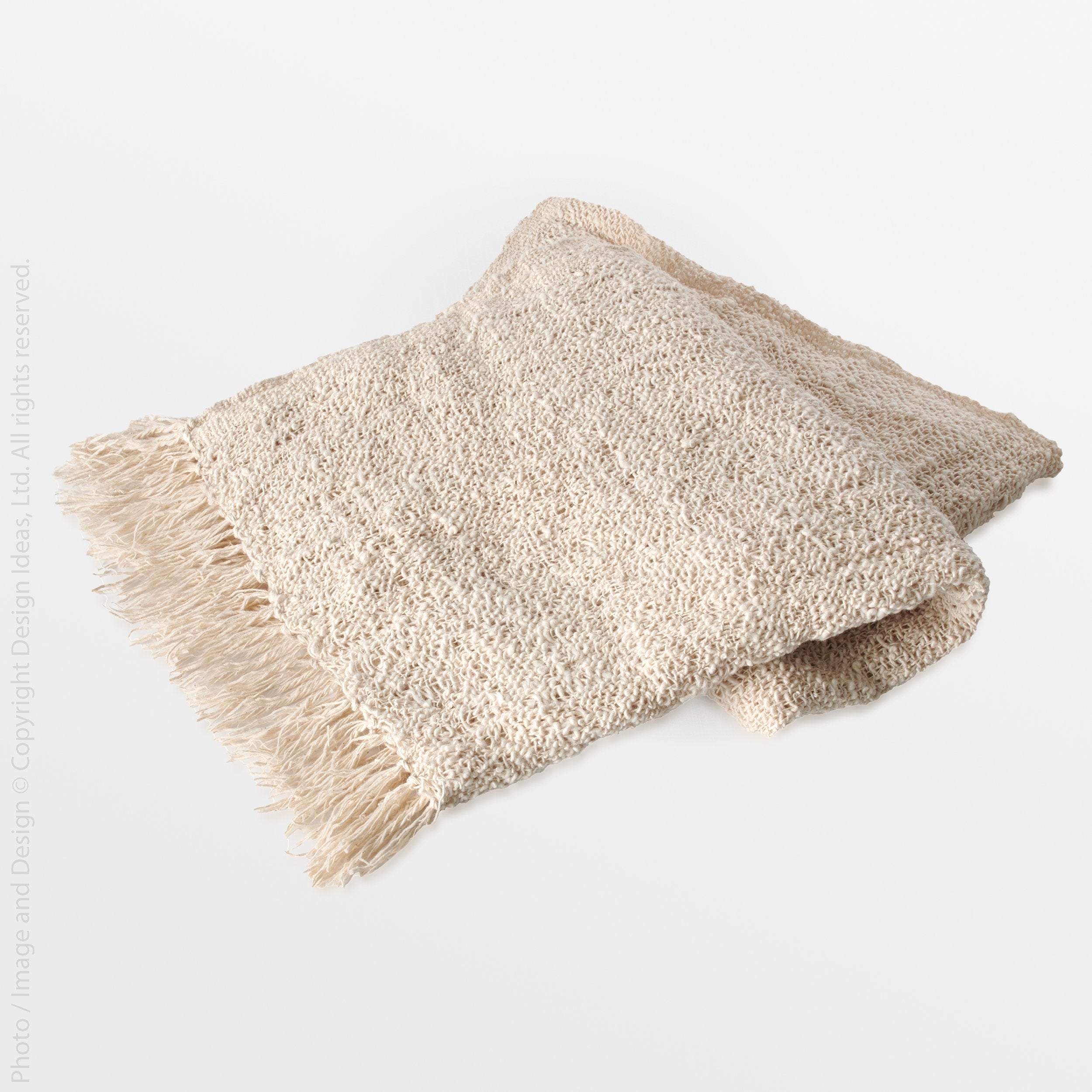 Capri Cotton Throw - natural Color | Image 1 | From the Capri Collection | Masterfully assembled with natural cotton for long lasting use | Available in natural color | texxture home