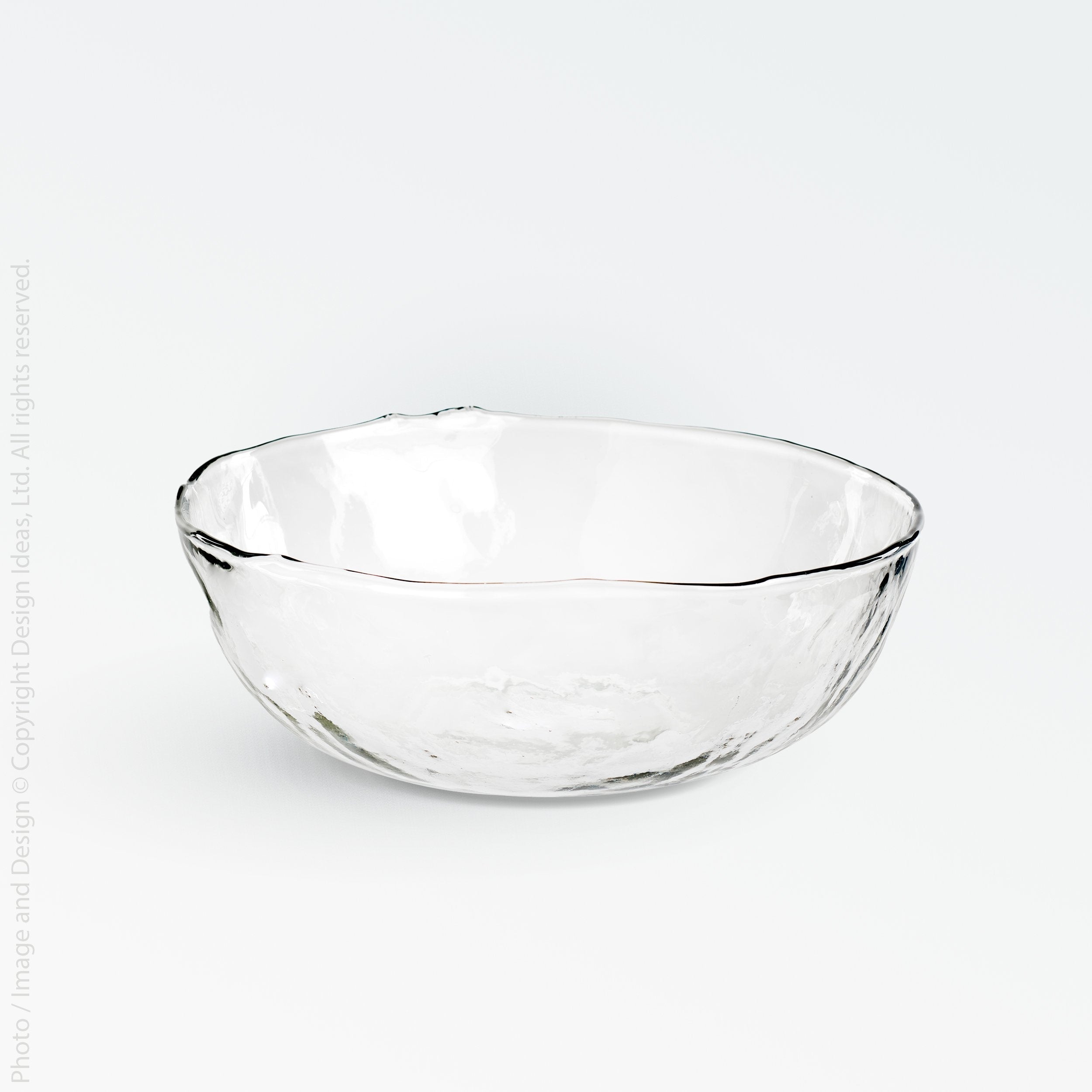 Wabisabi Glass Serving Bowl - Clear Color | Image 1 | From the Wabisabi Collection | Elegantly crafted with natural glass for long lasting use | Available in black color | texxture home