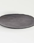 Stoneshard™ plate (11.8 dia x 0.5 in.) - Gray | Image 1 | Premium Plate from the Stoneshard collection | made with Riverstone for long lasting use | texxture