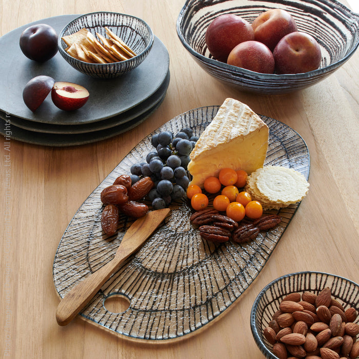 Stoneshard™ plate (11.8 dia x 0.5 in.) - Gray | Image 5 | Premium Plate from the Stoneshard collection | made with Riverstone for long lasting use | texxture