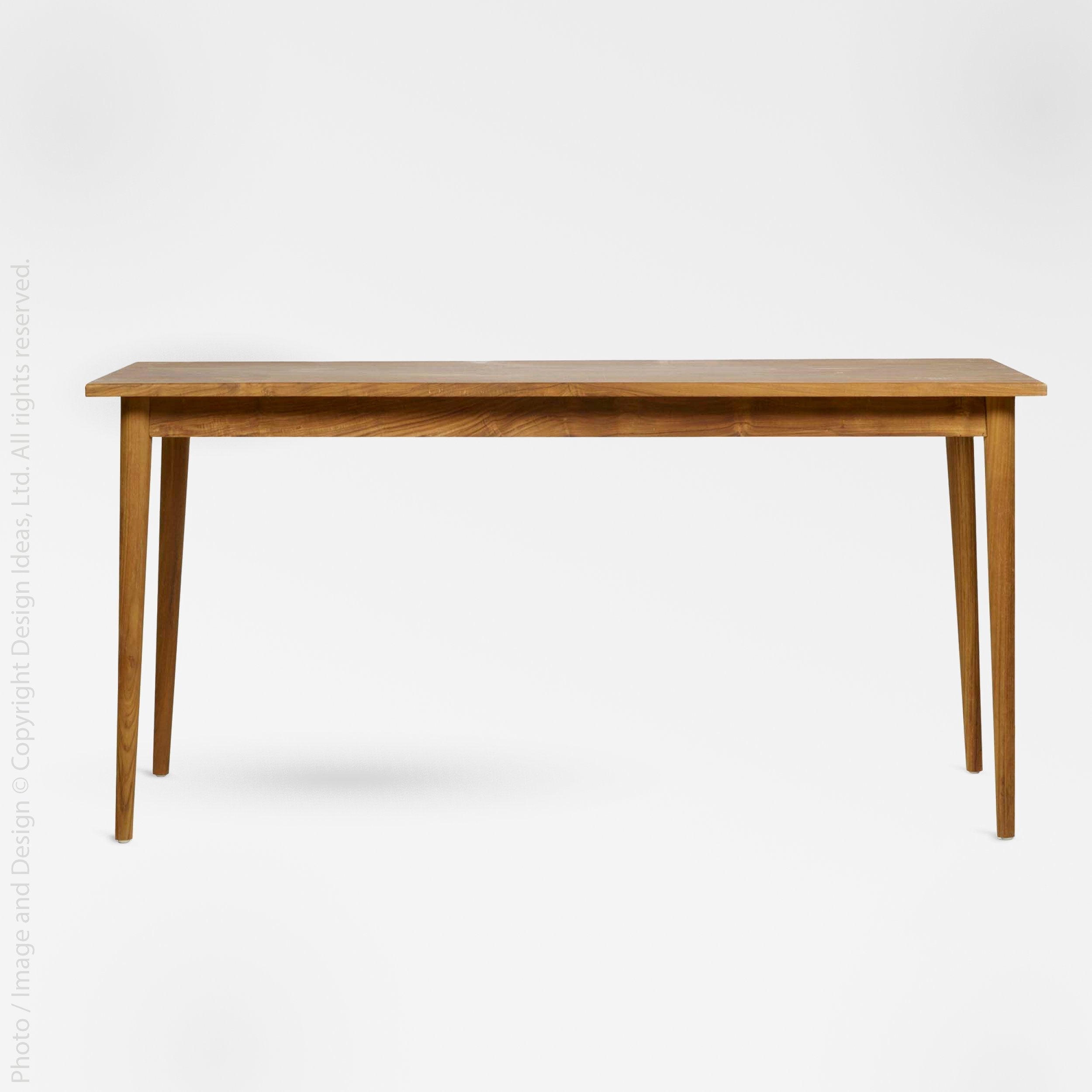 Oslo Teak Dining Table - Natural Color | Image 1 | From the Oslo Collection | Skillfully made with natural teak for long lasting use | This table is sustainably sourced | Available in natural color | texxture home