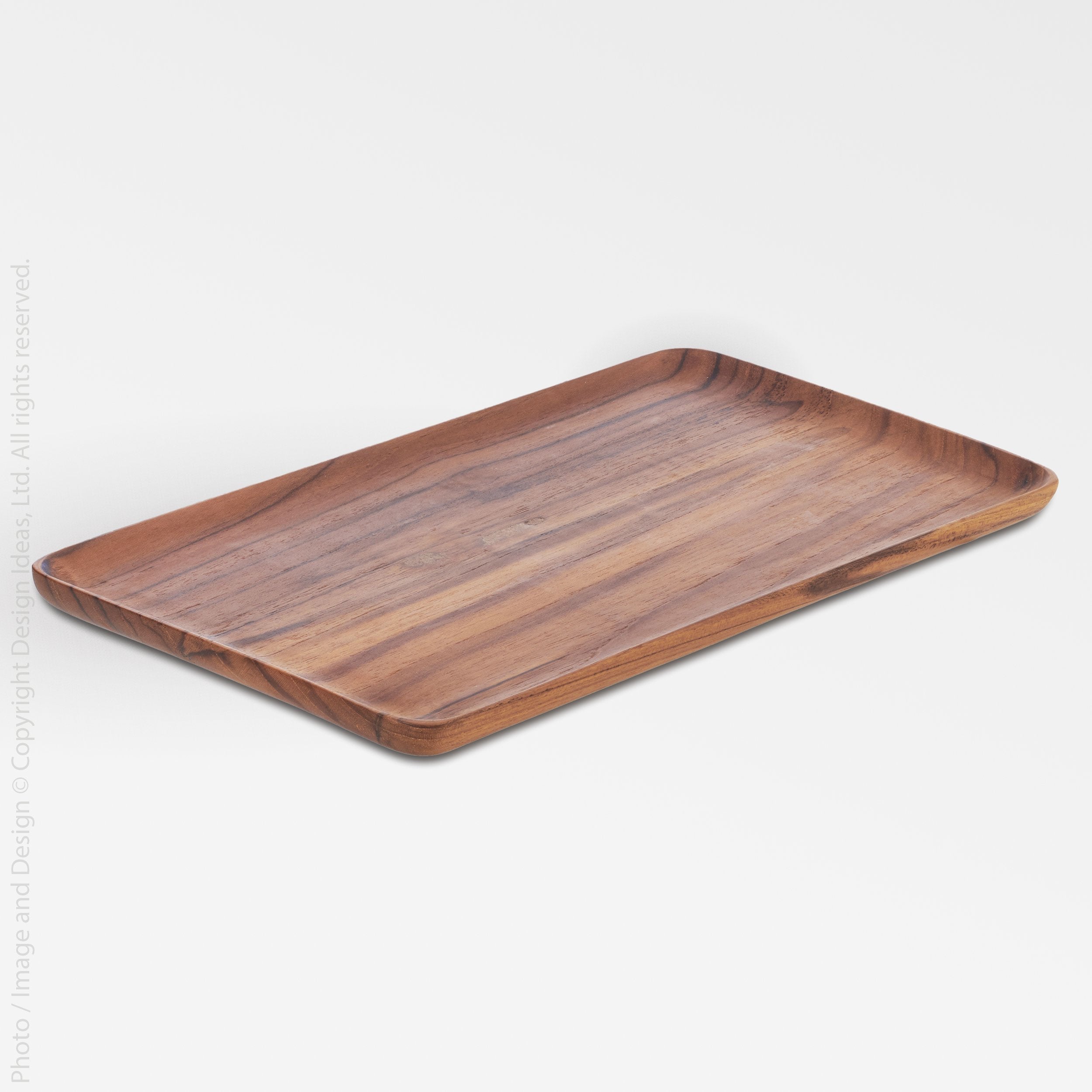 Chiku Teak Serving Tray - Clear Color | Image 1 | From the Chiku Collection | Skillfully assembled with natural teak for long lasting use | This tray is sustainably sourced | Available in natural color | texxture home