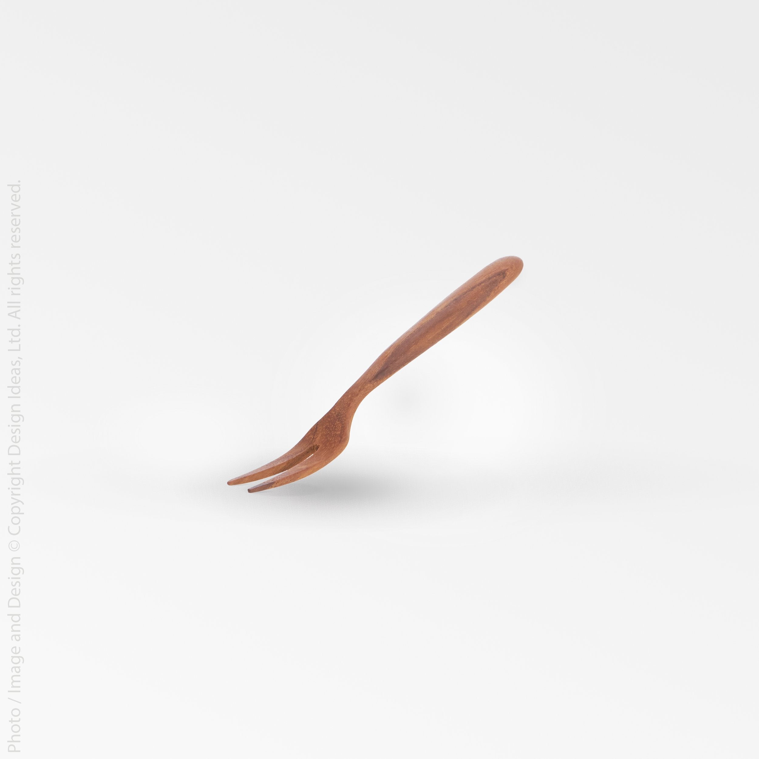 Chiku Teak Fork - Copper Color | Image 1 | From the Chiku Collection | Exquisitely assembled with natural teak for long lasting use | These utensils are sustainably sourced | Available in natural color | texxture home