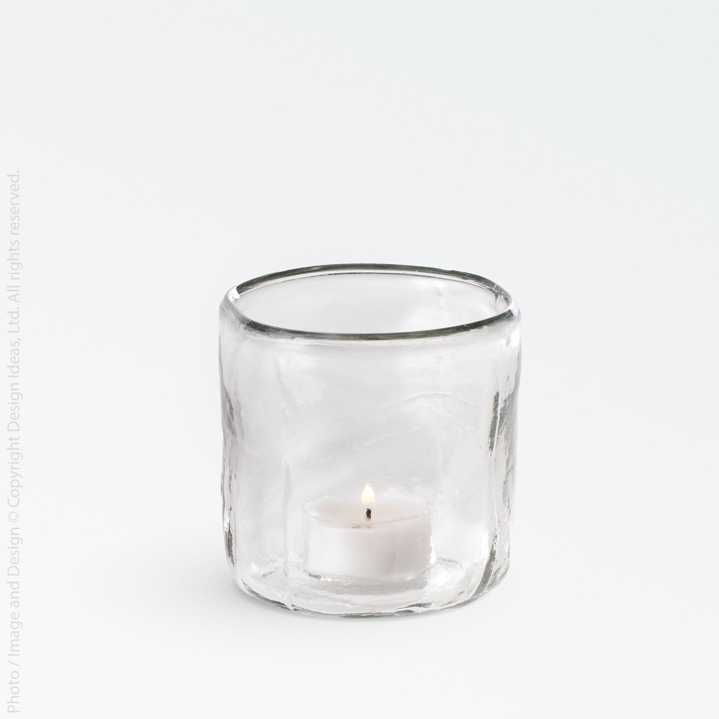Wabisabi Glass Votive Candle Holder - white color | Image 1 | From the Wabisabi Collection | Exquisitely crafted with natural glass for long lasting use | Available in clear color | texxture home