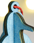 Festive™ Penguin 3D Wood Ornaments (assorted colors - set of 9)