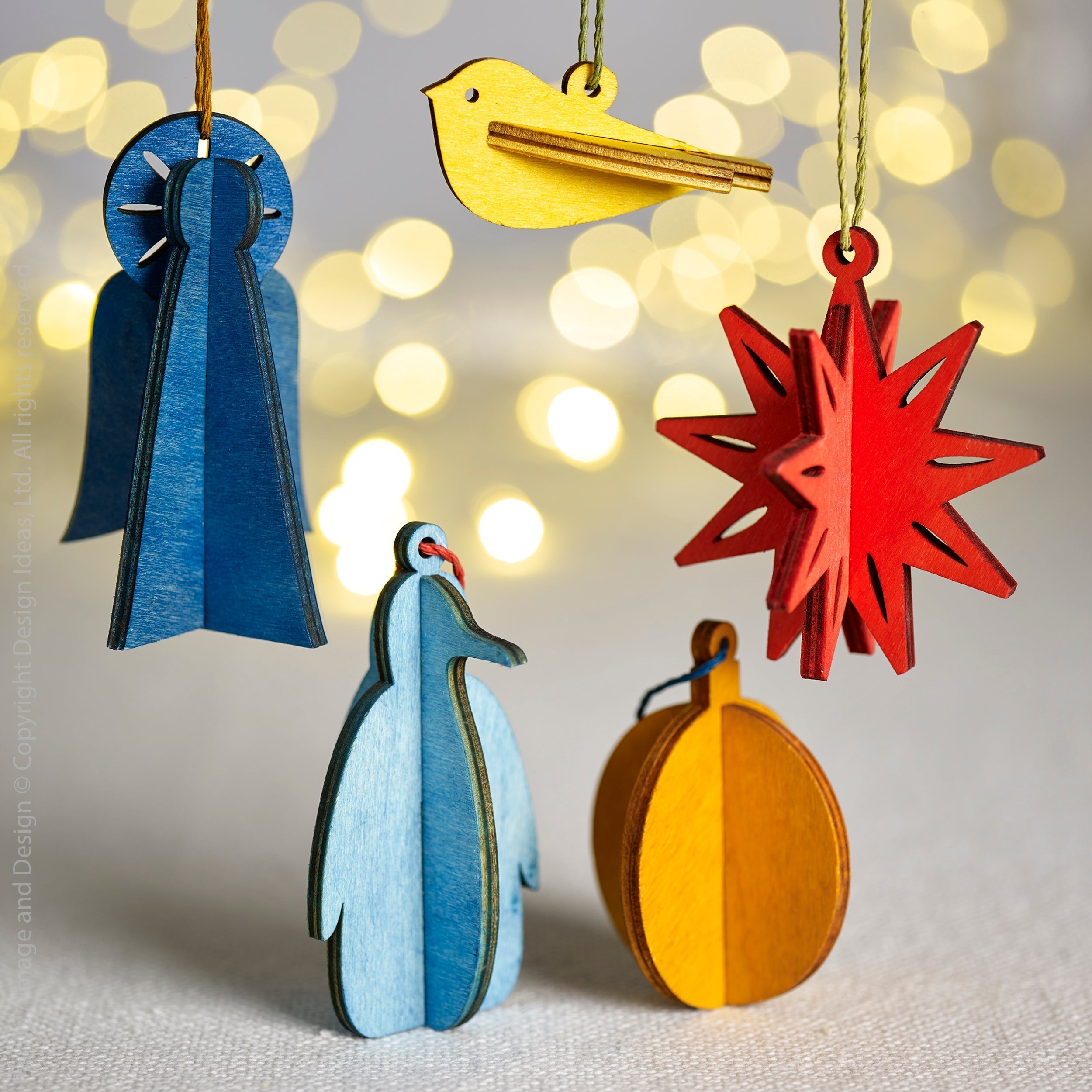 Festive Penguin 3D Wood Ornament Green Color | Image 2 | From the Festive Collection | Expertly constructed with natural wood for long lasting use | Available in white color | texxture home